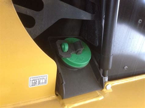 how to remove a catipilar skid steer fuel cap|cat skid steer water filter.